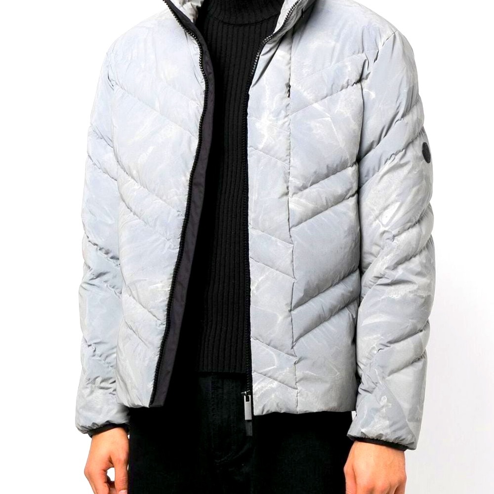 Patterned with an abstract muted take on camouflage print, this Monclear  🧥